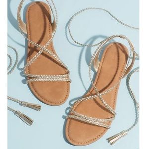 Metallic lace-up tassel flat gladiator sandals